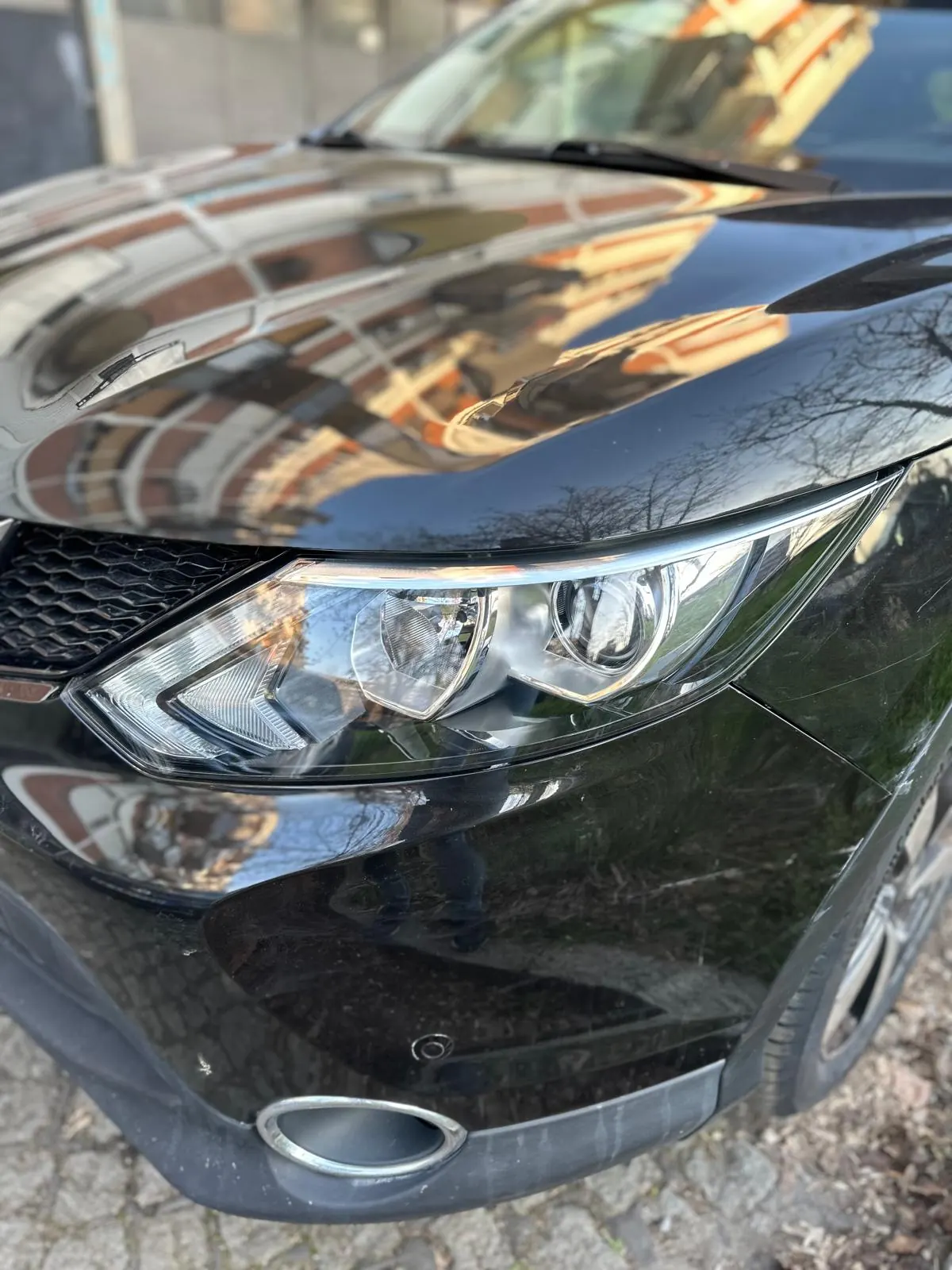 Nissan Qashqai kristalno čist sjajan far posle poliranja keramička zaštita Novi Beograd